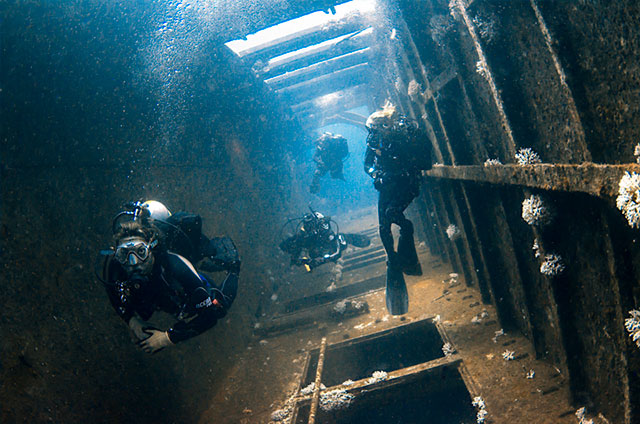 TAMUG scientific divers explore the wreck of the USTS Clipper during a Texas Parks and Wildlife Department Artificial Reef Program monitoring trip.