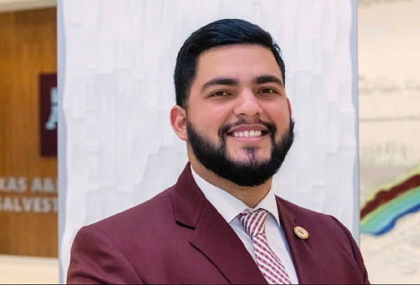 Castro posing for his Maroon Delegate head shot. 