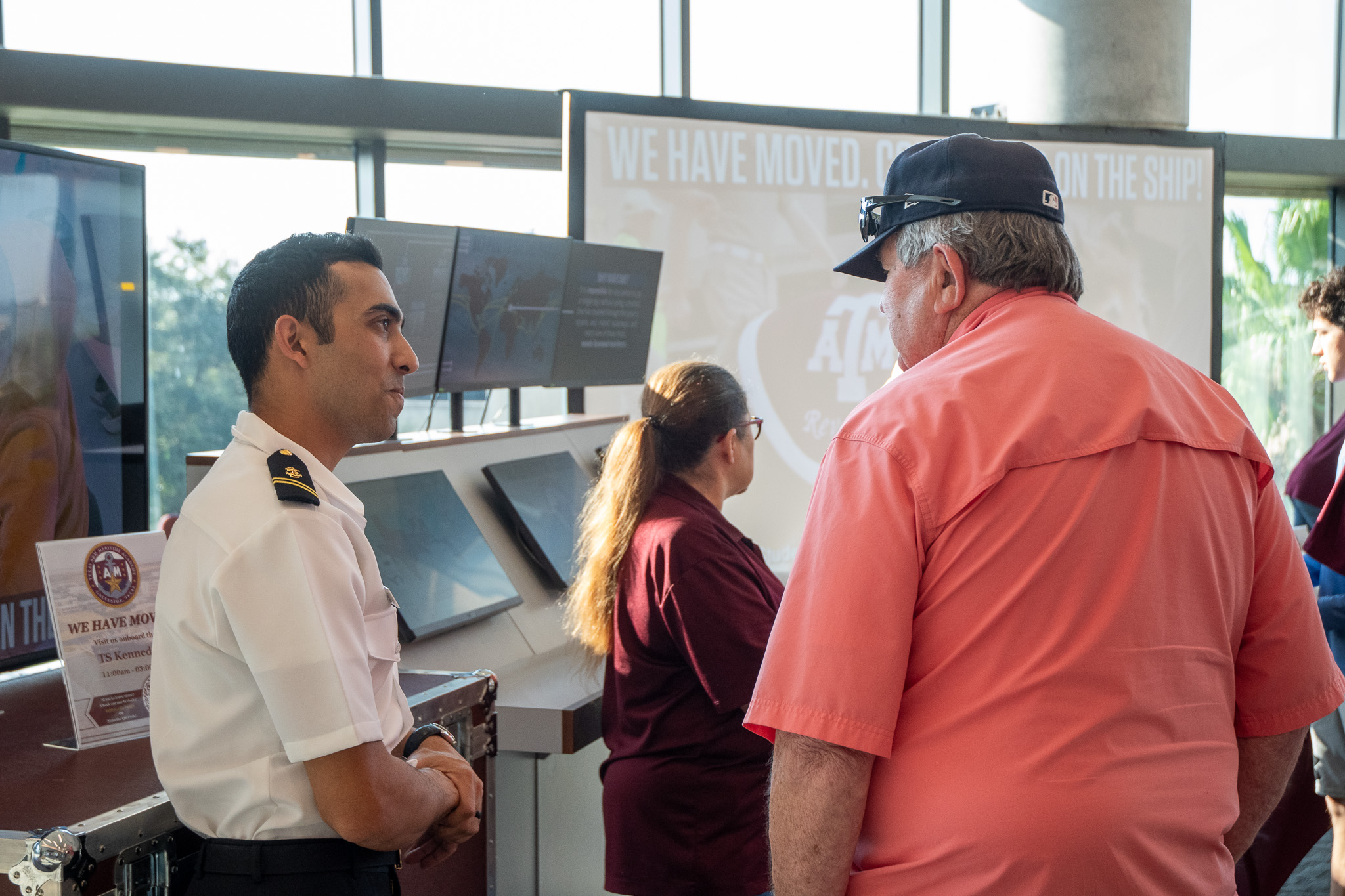 Cadet Cedric Standbridge talking to a visitor at Aggieland Saturday by the Sea