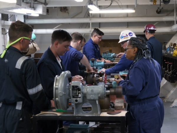 Vanicha McQueen, right, teaching students during summer sea term