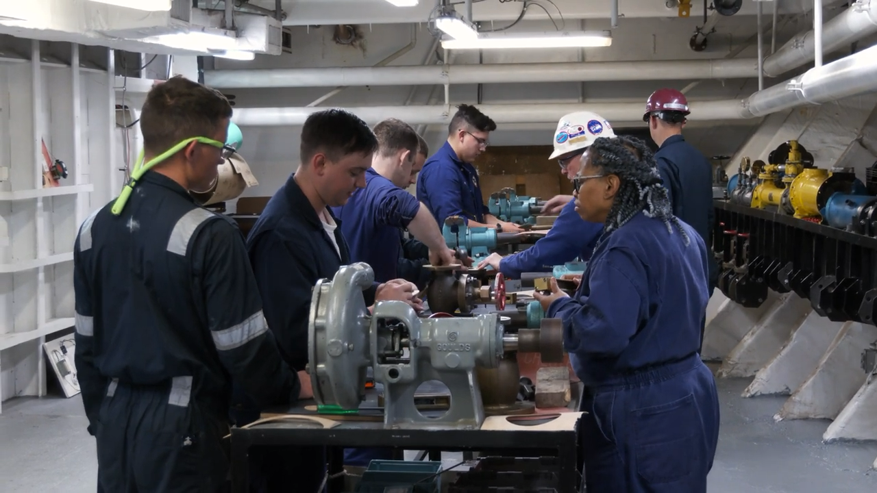 Vanicha McQueen, right, teaching students during summer sea term