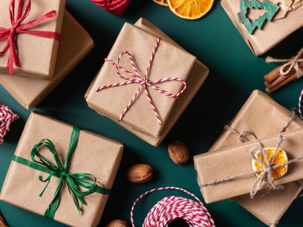 Packages with bows on them on green table