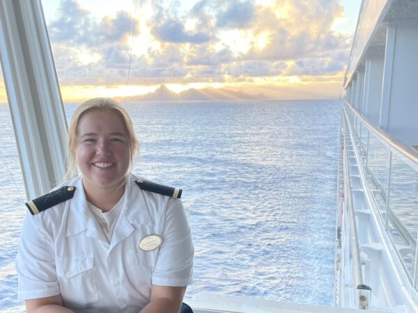 Alli DeYoung on cruise ship with ocean and sky in background