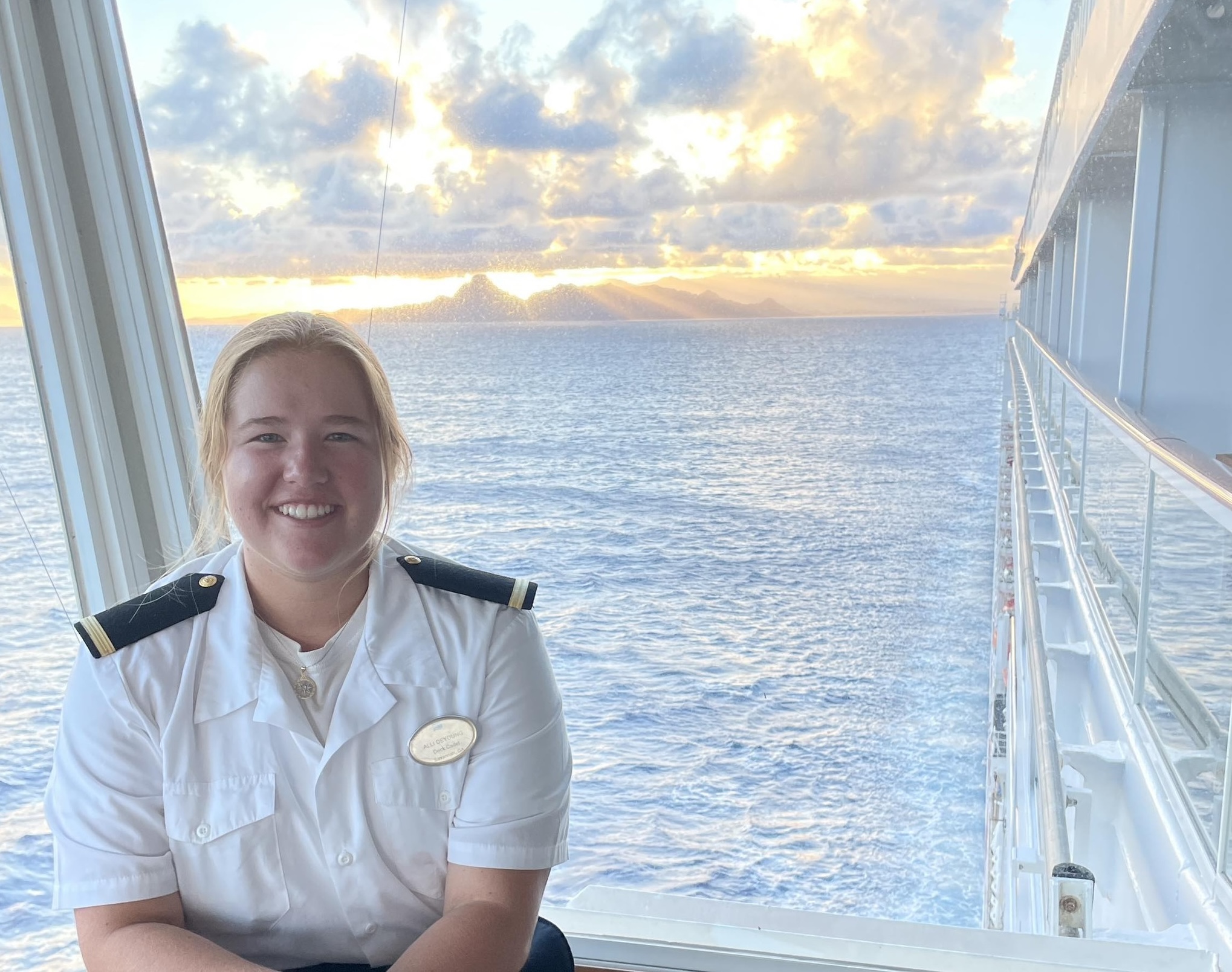 Alli DeYoung on cruise ship with ocean and sky in background
